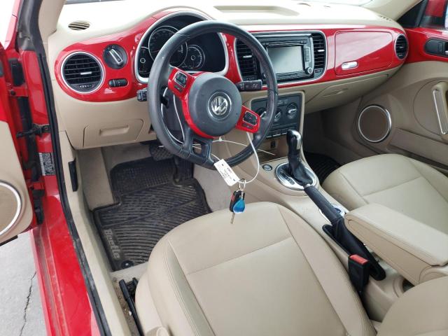 Photo 8 from auction – 2014 VOLKSWAGEN BEETLE with VIN 3VWJX7AT4EM629604