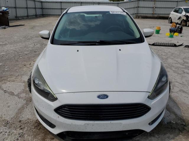 Photo 5 from auction – 2017 FORD FOCUS SE with VIN 1FADP3FE9HL309600