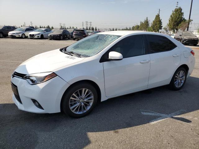 TOYOTA COROLLA L 2015 with VIN 5YFBURHE4FP291070 - Photo from auction
