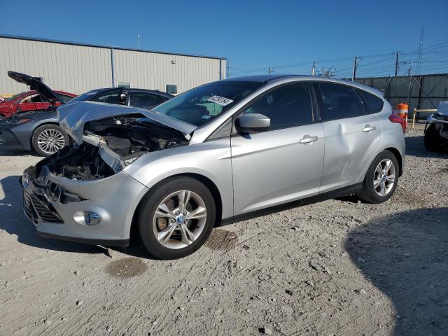FORD FOCUS SE 2012 مع رقم تعريف المركبة 1FAHP3K20CL301164 - صورة من المزاد