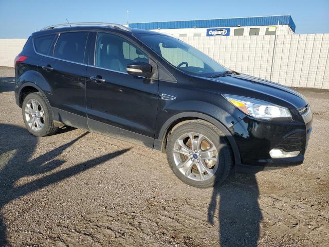 Photo 4 from auction – 2014 FORD ESCAPE TIT with VIN 1FMCU9J99EUB16182