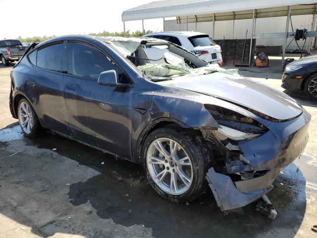 Photo 4 from auction – 2022 TESLA MODEL Y with VIN 7SAYGDEE5NF553720