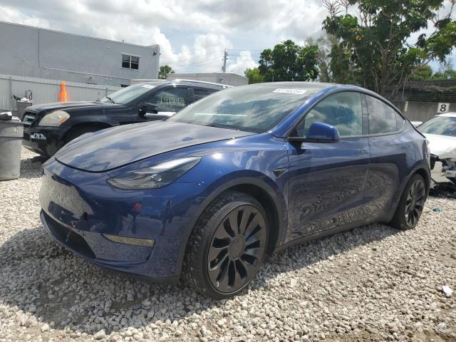 TESLA MODEL Y 2022 with VIN 7SAYGDEF6NF455028 - Photo from auction