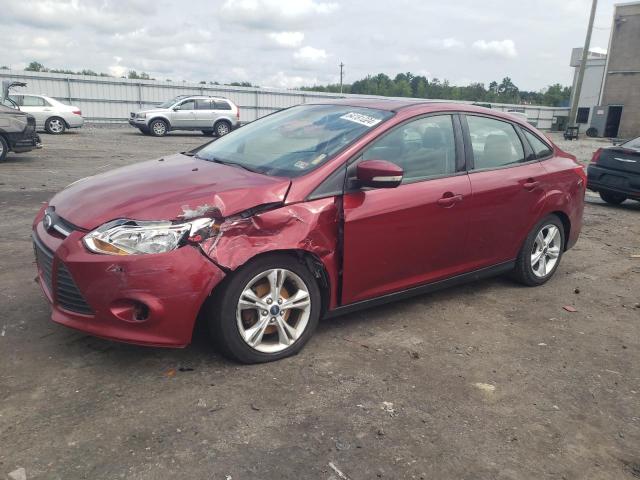 FORD FOCUS SE 2014 with VIN 1FADP3F21EL147320 - Photo from auction