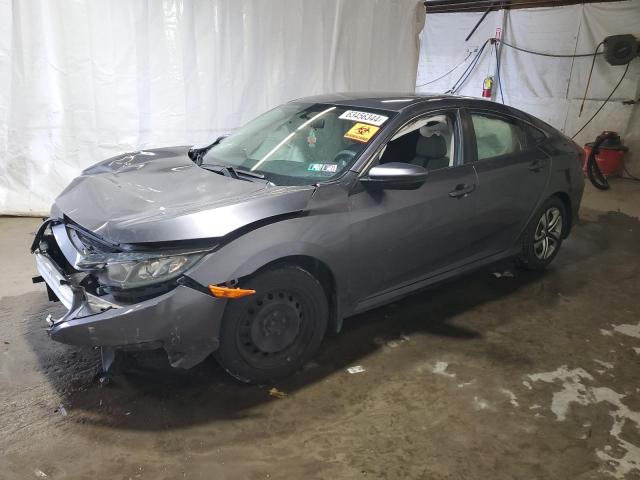 HONDA CIVIC LX 2018 with VIN 2HGFC2F53JH525620 - Photo from auction