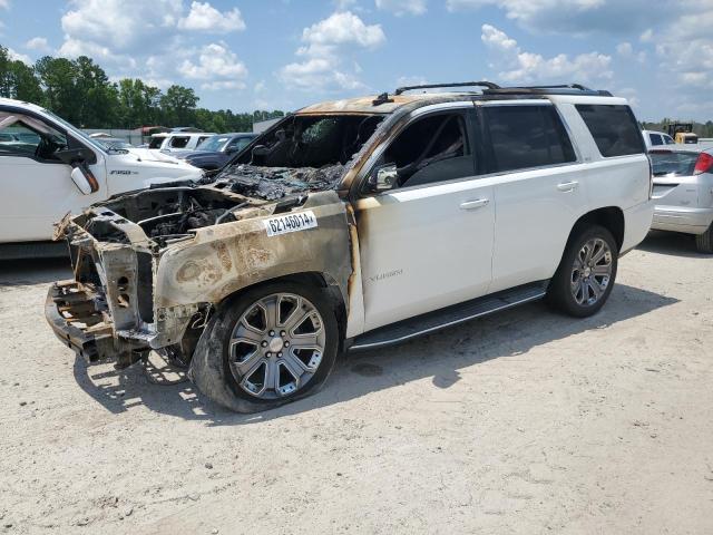 GMC YUKON SLT 2016 with VIN 1GKS1BKC8GR216830 - Photo from auction