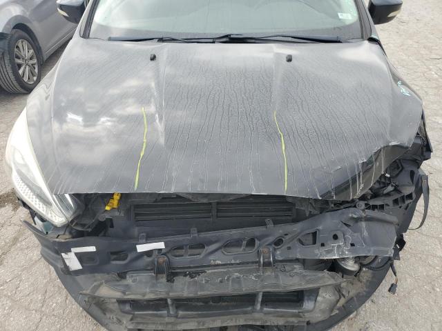 Foto 11 de la subasta – 2015 FORD FOCUS SE con VIN 1FADP3K28FL260544