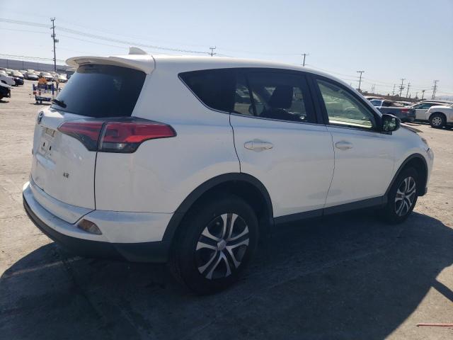 Photo 3 from auction – 2018 TOYOTA RAV4 LE with VIN JTMZFREV1JJ741736