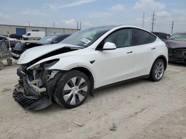 TESLA MODEL Y 2024 with VIN 7SAYGAEEXRF983697 - Photo from auction