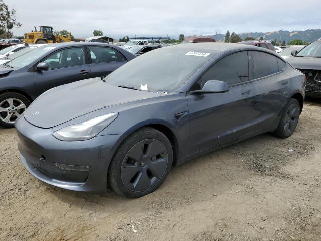 TESLA MODEL 3 2022 with VIN 5YJ3E1EB9NF298863 - Photo from auction