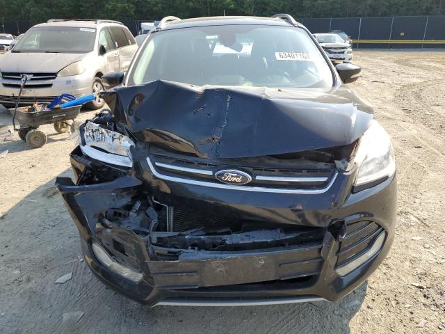 Photo 11 from auction – 2016 FORD ESCAPE TIT with VIN 1FMCU9J94GUA17451