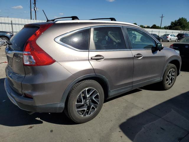 Photo 3 from auction – 2016 HONDA CR-V EXL with VIN 5J6RM4H78GL038647