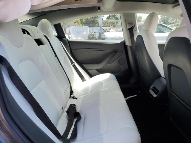 Photo 10 from auction – 2022 TESLA MODEL 3 with VIN 5YJ3E1ECXNF328607