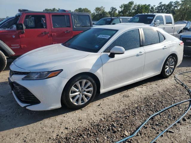 TOYOTA CAMRY LE 2020 with VIN 4T1C11AK2LU370133 - Photo from auction