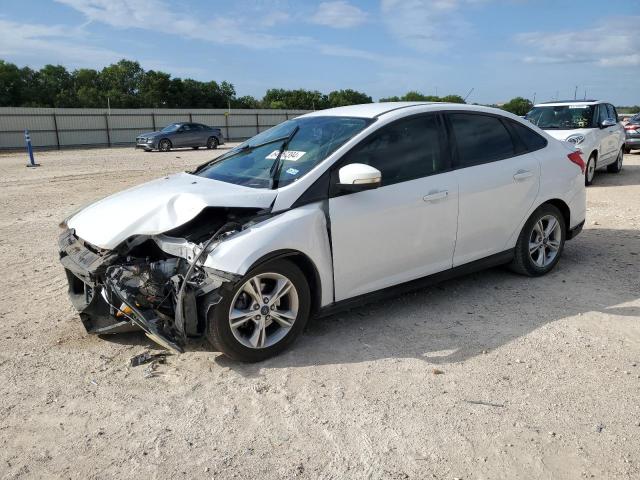FORD FOCUS SE 2014 with VIN 1FADP3F25EL383081 - Photo from auction