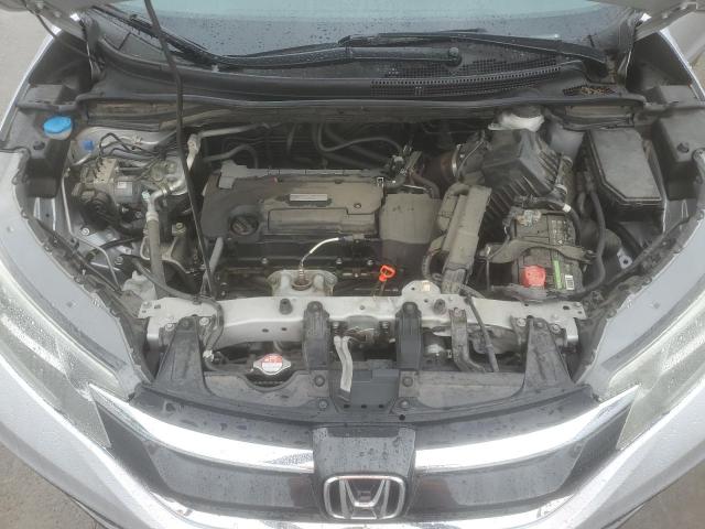 Photo 12 from auction – 2016 HONDA CR-V LX with VIN 2HKRM3H35GH537374