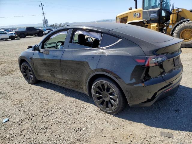 Photo 2 from auction – 2023 TESLA MODEL Y with VIN 7SAYGAEE4PF695123