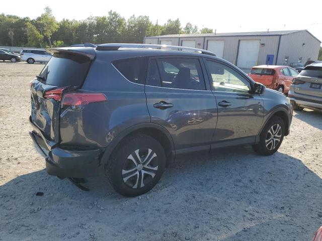 Photo 3 from auction – 2018 TOYOTA RAV4 LE with VIN JTMBFREV6JD252040