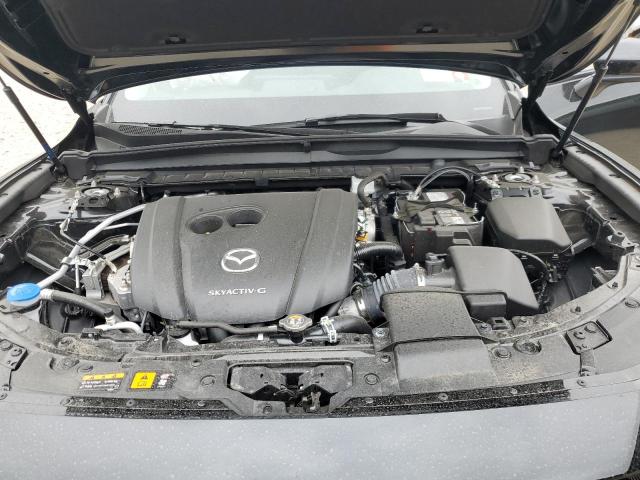 Photo 12 from auction – 2023 MAZDA CX-50 PREF with VIN 7MMVABCM3PN154096