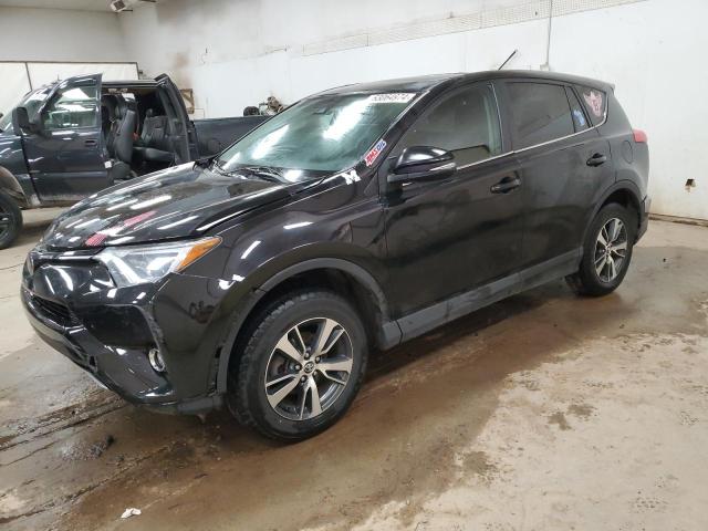 TOYOTA RAV4 XLE 2017 with VIN 2T3RFREV8HW591068 - Photo from auction