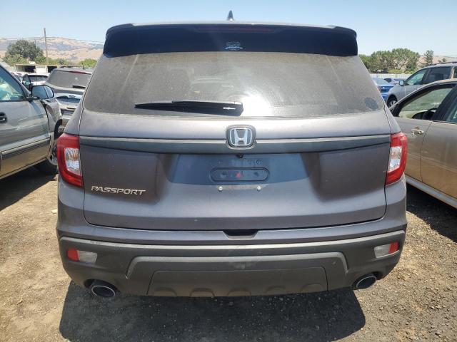Photo 6 from auction – 2021 HONDA PASSPORT E with VIN 5FNYF7H5XMB013999
