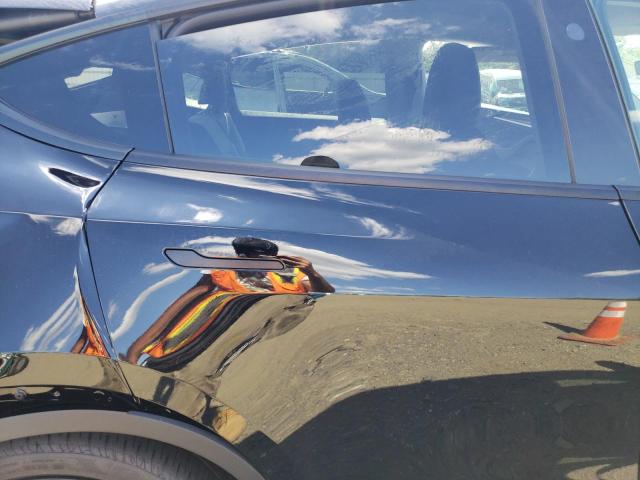Photo 11 from auction – 2024 TESLA MODEL Y with VIN 7SAYGDED4RF091972