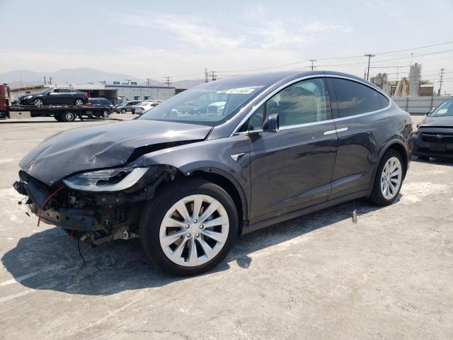 TESLA MODEL X 2018 with VIN 5YJXCBE24JF115568 - Photo from auction