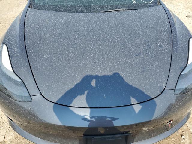 Photo 11 from auction – 2022 TESLA MODEL 3 with VIN 5YJ3E1EC2NF202063