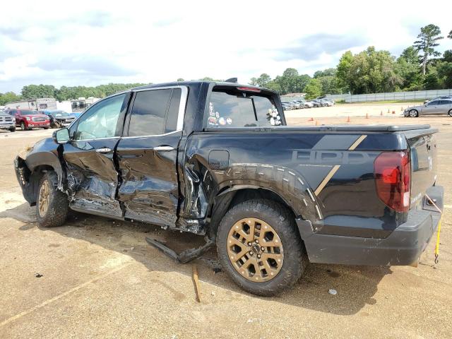 Photo 2 from auction – 2021 HONDA RIDGELINE with VIN 5FPYK3F76MB008587