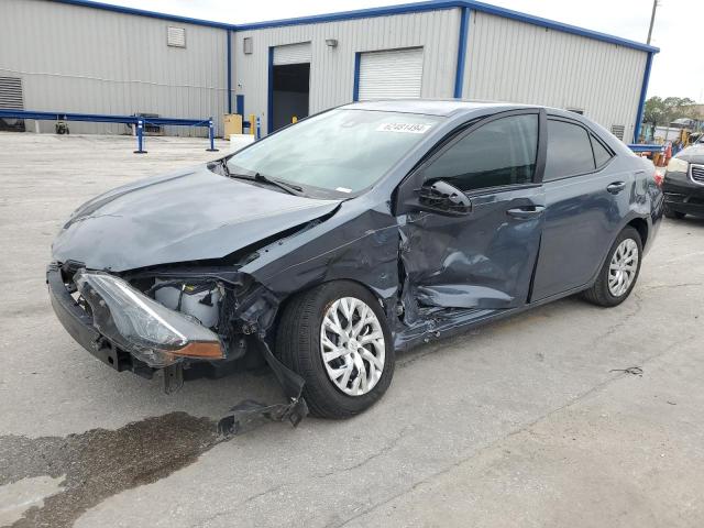 TOYOTA COROLLA L 2018 with VIN 5YFBURHE7JP787425 - Photo from auction
