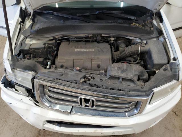 Photo 11 from auction – 2014 HONDA RIDGELINE with VIN 5FPYK1F53EB009121