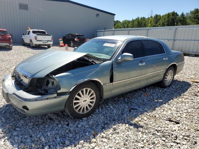 LINCOLN TOWN CAR E 2004 with VIN 1LNHM81W54Y609810 - Photo from auction