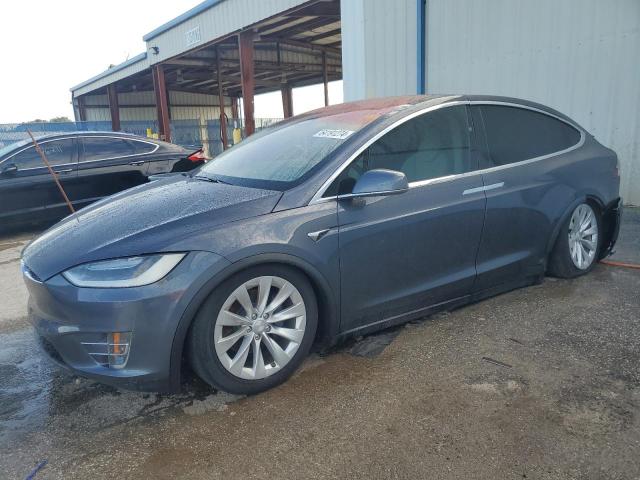 TESLA MODEL X 2018 with VIN 5YJXCDE2XJF088324 - Photo from auction