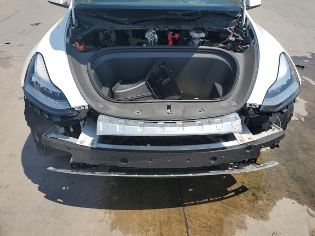 Photo 12 from auction – 2023 TESLA MODEL Y with VIN 7SAYGDEE2PA059556