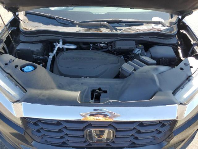 Photo 12 from auction – 2023 HONDA PASSPORT E with VIN 5FNYF8H53PB003292