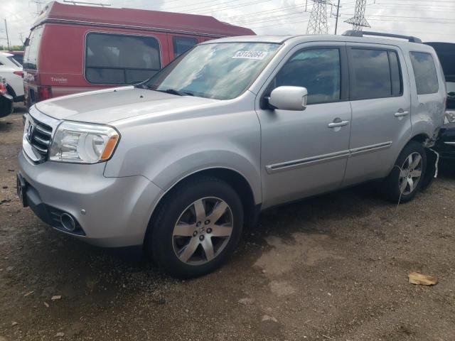 HONDA PILOT TOUR 2014 with VIN 5FNYF4H97EB020752 - Photo from auction