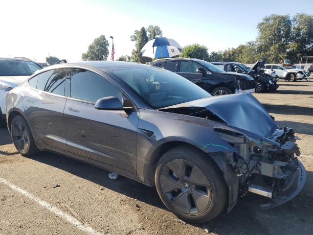 Photo 4 from auction – 2023 TESLA MODEL 3 with VIN 5YJ3E1EAXPF711898