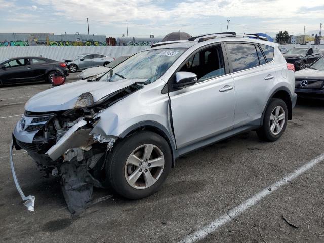 TOYOTA RAV4 XLE 2014 with VIN JTMRFREV6EJ005302 - Photo from auction