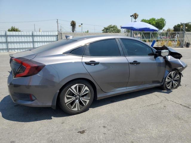 Photo 3 from auction – 2018 HONDA CIVIC EX with VIN JHMFC1F34JX037259