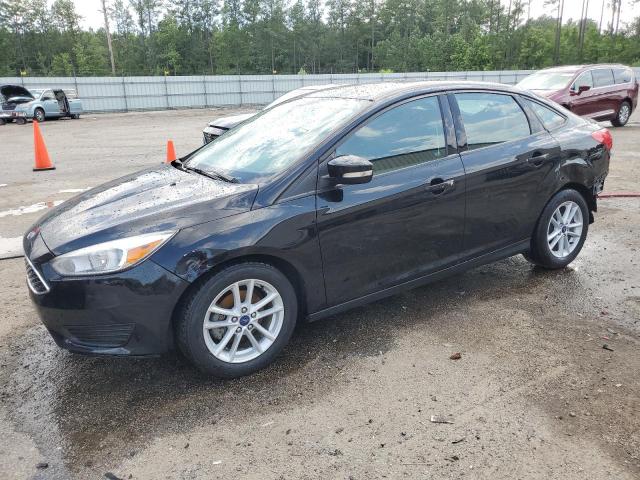 FORD FOCUS SE 2017 with VIN 1FADP3F29HL346832 - Photo from auction