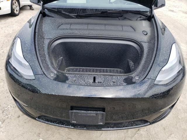 Photo 11 from auction – 2023 TESLA MODEL Y with VIN 7SAYGDEEXPA205699