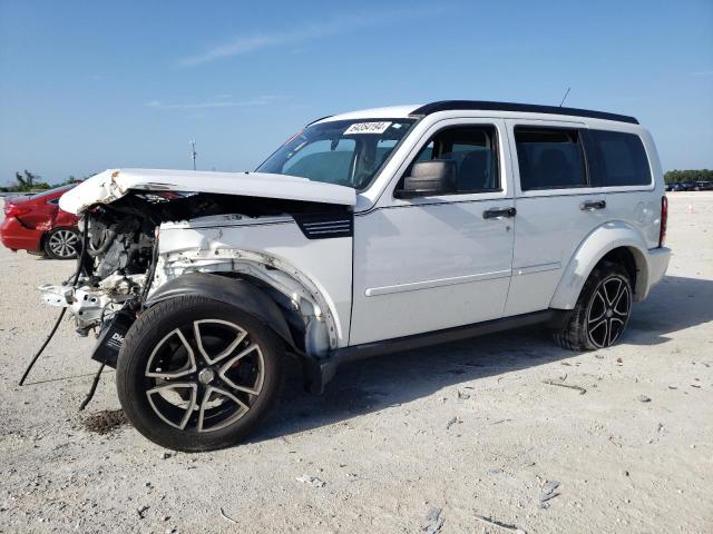 DODGE NITRO 2011 with VIN 1D4PT2GK3BW520236 - Photo from auction