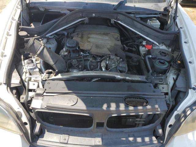 Photo 11 from auction – 2010 BMW X5 XDRIVE3 with VIN 5UXFF0C55ALT77518
