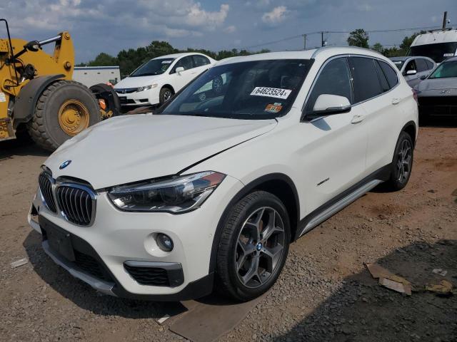BMW X1 XDRIVE2 2017 with VIN WBXHT3C3XH5F79326 - Photo from auction