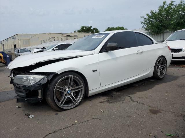 BMW 335 IS 2011 with VIN WBADX1C56BE569755 - Photo from auction