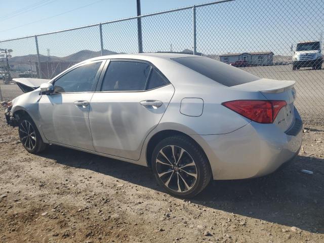 Photo 2 from auction – 2018 TOYOTA COROLLA L with VIN 5YFBURHE5JP797581