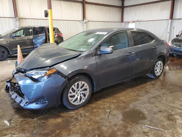TOYOTA COROLLA L 2017 with VIN 5YFBURHE0HP677715 - Photo from auction