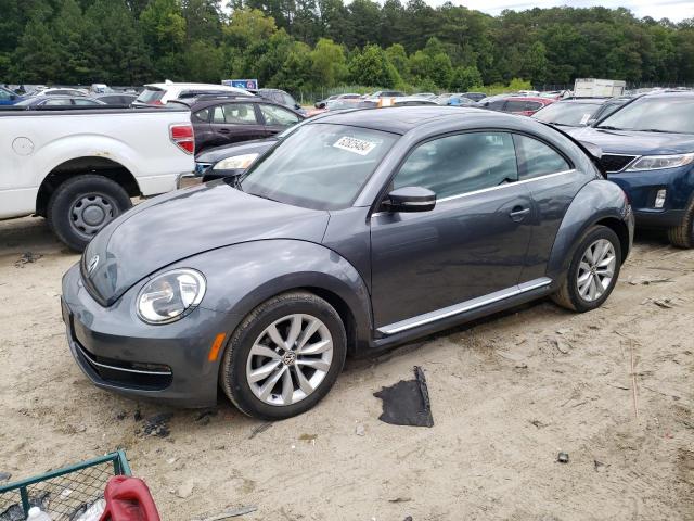 VOLKSWAGEN BEETLE 2014 with VIN 3VWJL7AT3EM606150 - Photo from auction