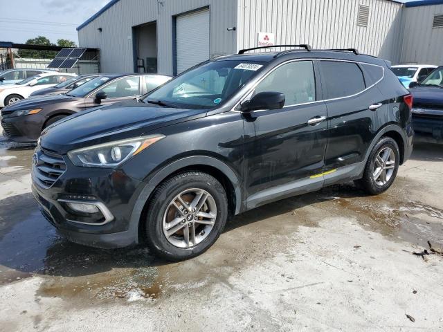 HYUNDAI SANTA FE S 2017 with VIN 5NMZU3LBXHH016664 - Photo from auction