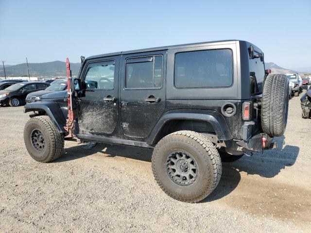 Photo 2 from auction – 2011 JEEP WRANGLER U with VIN 1J4BA5H12BL594036